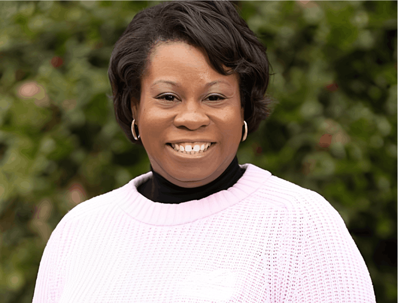 Woman with short hair, outdoor background